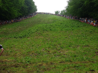 It's back for May 2023, the Cooper's Hill Cheese-Rolling race in Gloucester, England!